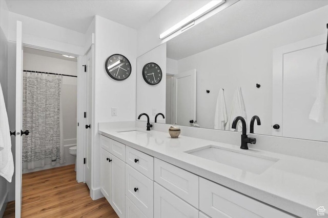 723 W 800 S, Springville, UT 84663 - full bathroom with double vanity, wood finished floors, and a shower with shower curtain