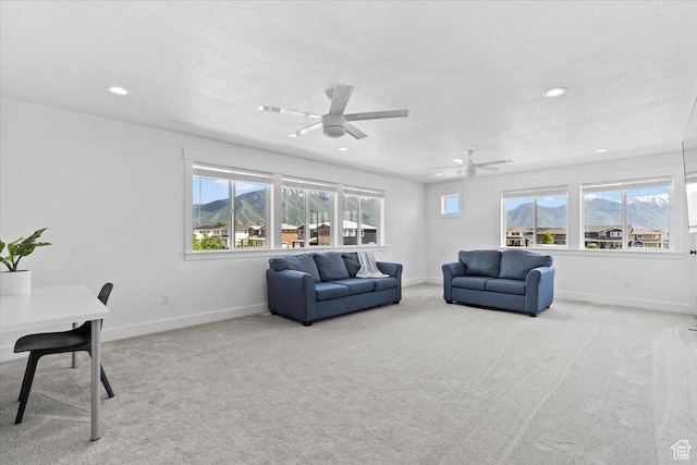 723 W 800 S, Springville, UT 84663 - living area with recessed lighting, carpet flooring, a mountain view, ceiling fan, and a textured ceiling
