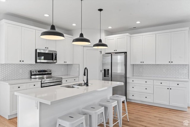 723 W 800 S, Springville, UT 84663 - kitchen with stainless steel appliances, white cabinetry, and recessed lighting