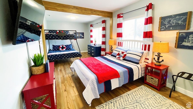 325 S 100 W, Garden City, UT 84028 - bedroom with wood finished floors and beamed ceiling