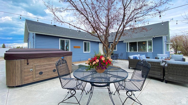 325 S 100 W, Garden City, UT 84028 - view of patio / terrace featuring a hot tub, outdoor lounge area, and outdoor dining area