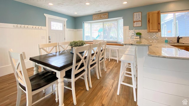 325 S 100 W, Garden City, UT 84028 - dining area with recessed lighting, light wood-style floors, and wainscoting