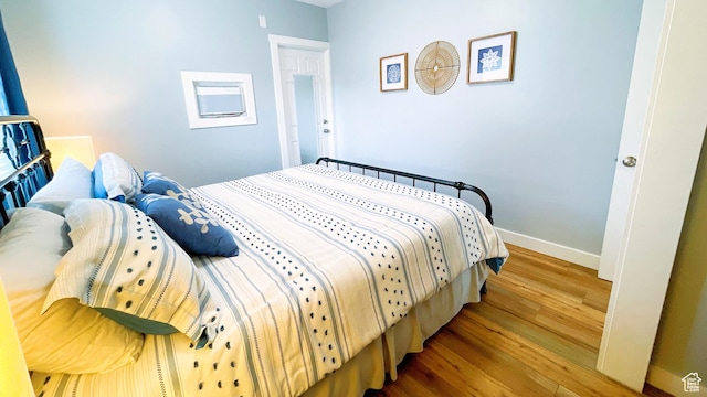 325 S 100 W, Garden City, UT 84028 - bedroom with wood finished floors and baseboards