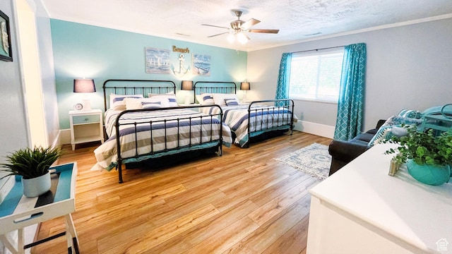 325 S 100 W, Garden City, UT 84028 - bedroom featuring crown molding, wood finished floors, and ceiling fan