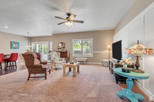5319 W Elsmere Ln S, Herriman, UT 84096 - carpeted living area with a ceiling fan and a textured ceiling