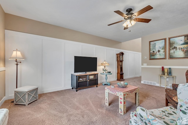 5319 W Elsmere Ln S, Herriman, UT 84096 - living area featuring ceiling fan, light colored carpet, and a decorative wall