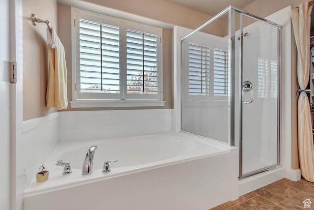 5319 W Elsmere Ln S, Herriman, UT 84096 - bathroom featuring a garden tub and a stall shower