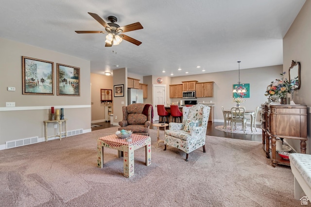 5319 W Elsmere Ln S, Herriman, UT 84096 - living area featuring ceiling fan, light colored carpet, and recessed lighting