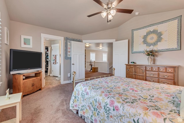5319 W Elsmere Ln S, Herriman, UT 84096 - bedroom featuring vaulted ceiling, carpet flooring, a walk in closet, and ceiling fan