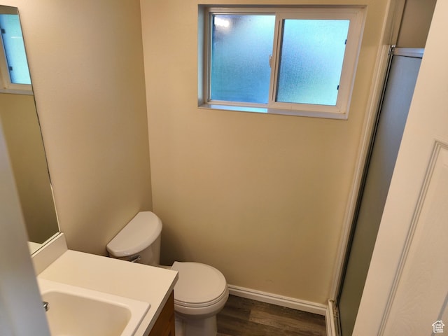 411 S Ridge Rd, Cedar City, UT 84720 - full bathroom featuring wood finished floors, vanity, and an enclosed shower