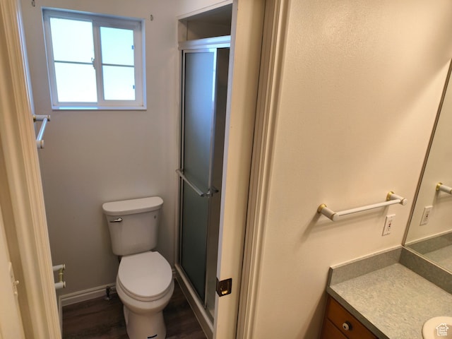 411 S Ridge Rd, Cedar City, UT 84720 - full bathroom with vanity, a stall shower, and wood finished floors