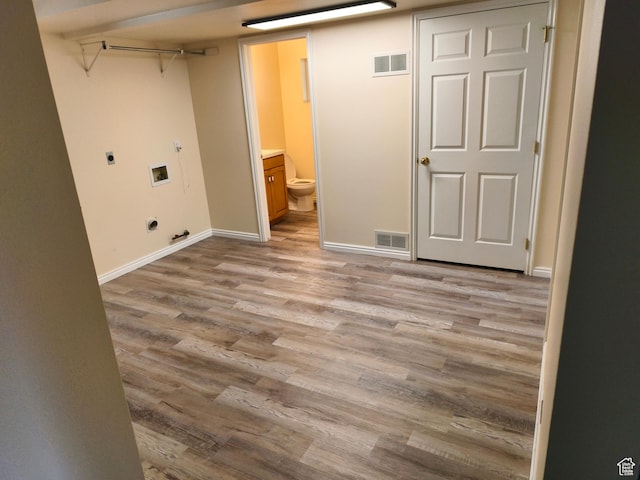 411 S Ridge Rd, Cedar City, UT 84720 - laundry area with gas dryer hookup, hookup for an electric dryer, light wood-style floors, and hookup for a washing machine