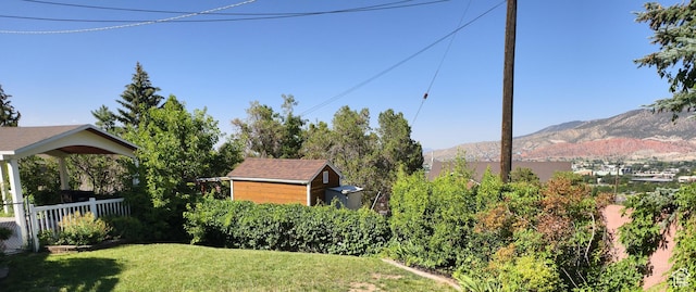 411 S Ridge Rd, Cedar City, UT 84720 - view of yard featuring a mountain view and a shed
