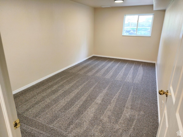 411 S Ridge Rd, Cedar City, UT 84720 - spare room featuring dark carpet and baseboards