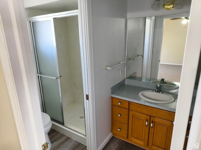 411 S Ridge Rd, Cedar City, UT 84720 - full bathroom featuring wood finished floors, vanity, and a stall shower