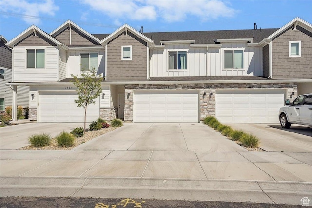 3270 N 3325 W Unit 386B, Plain City, UT 84404 - craftsman house with stone siding, board and batten siding, concrete driveway, and an attached garage