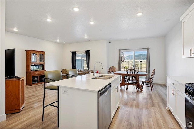 3270 N 3325 W Unit 386B, Plain City, UT 84404 - kitchen with dishwasher, light wood finished floors, light countertops, white cabinets, and recessed lighting
