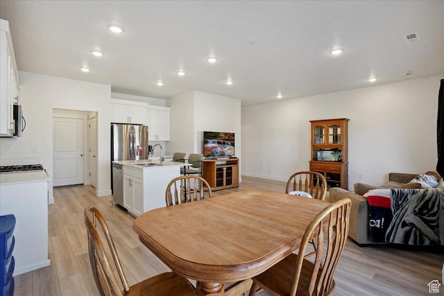 3270 N 3325 W Unit 386B, Plain City, UT 84404 - dining space featuring light wood finished floors and recessed lighting