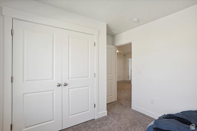 3270 N 3325 W Unit 386B, Plain City, UT 84404 - bedroom featuring carpet flooring and a closet