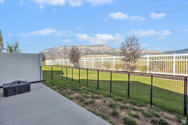 3270 N 3325 W Unit 386B, Plain City, UT 84404 - fenced backyard with a patio and a mountain view