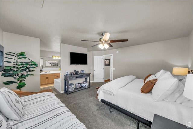 2045 S 1400 E Unit 8, St George, UT 84790 - bedroom featuring dark carpet, connected bathroom, and a ceiling fan