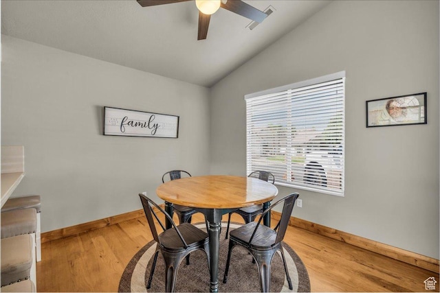 2045 S 1400 E Unit 8, St George, UT 84790 - dining area featuring vaulted ceiling, a ceiling fan, and light wood-style floors