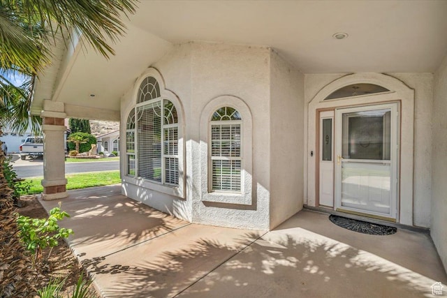 2045 S 1400 E Unit 8, St George, UT 84790 - entrance to property featuring stucco siding and a porch