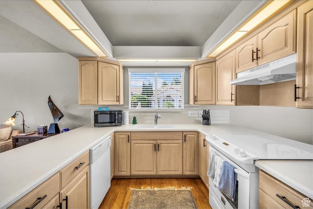 2045 S 1400 E Unit 8, St George, UT 84790 - kitchen with white appliances, light brown cabinets, and under cabinet range hood