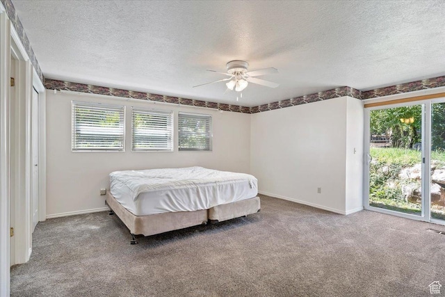484 E 3450 N, North Ogden, UT 84414 - bedroom featuring access to outside, a textured ceiling, carpet floors, and multiple windows