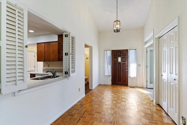 484 E 3450 N, North Ogden, UT 84414 - entrance foyer with a chandelier and a towering ceiling