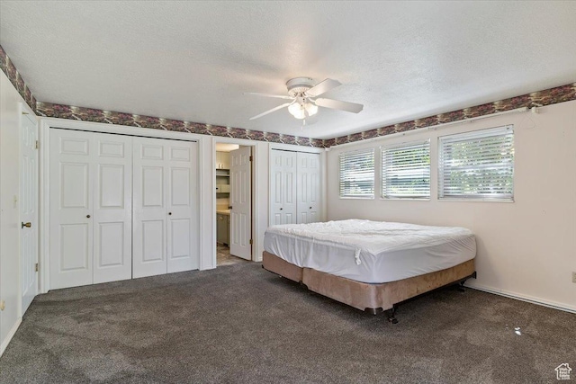 484 E 3450 N, North Ogden, UT 84414 - bedroom with multiple closets, carpet, a textured ceiling, and a ceiling fan