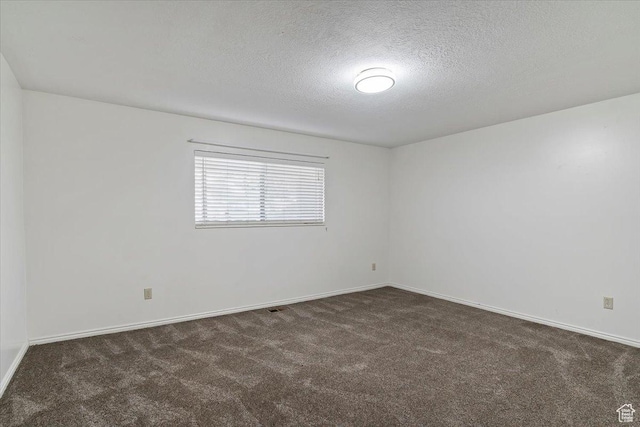 484 E 3450 N, North Ogden, UT 84414 - unfurnished room with dark carpet and a textured ceiling