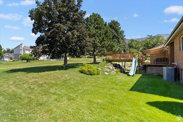484 E 3450 N, North Ogden, UT 84414 - view of grassy yard featuring a deck with mountain view