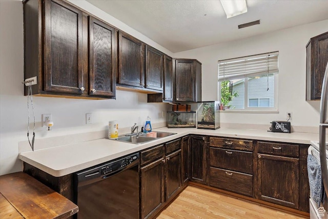 2421 N 400 E Unit C4, North Ogden, UT 84414 - kitchen with black dishwasher, dark brown cabinets, light wood finished floors, and light countertops