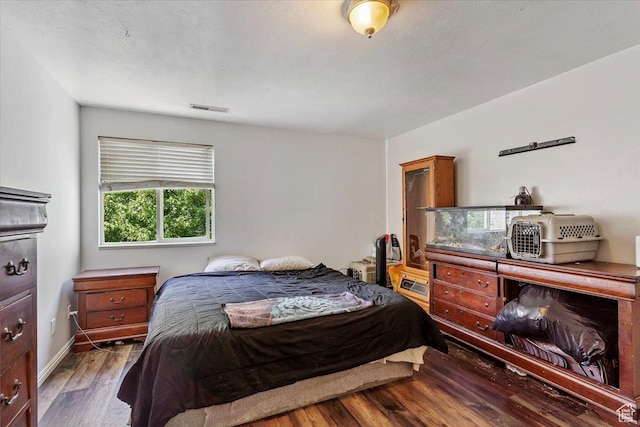 2421 N 400 E Unit C4, North Ogden, UT 84414 - bedroom featuring wood finished floors and baseboards