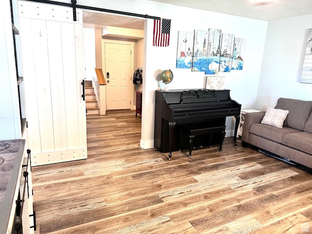 4086 W Wind River Dr, West Jordan, UT 84088 - living room featuring light wood-style floors and a barn door