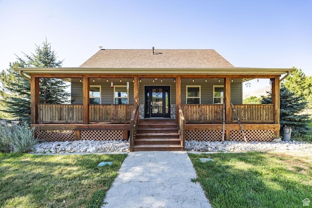 9115 W 25800 N, Portage, UT 84331 - view of front of house featuring a porch, a front lawn, and a shingled roof