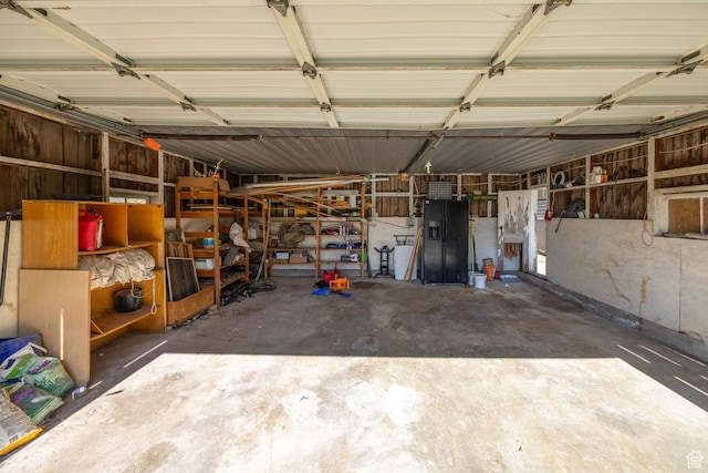 9115 W 25800 N, Portage, UT 84331 - garage with black fridge with ice dispenser