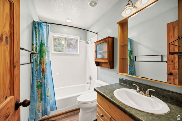 9115 W 25800 N, Portage, UT 84331 - bathroom featuring a textured ceiling, shower / tub combo, vanity, and wood finished floors