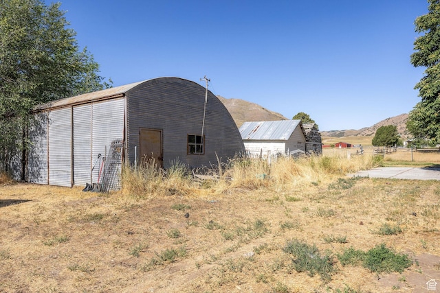 9115 W 25800 N, Portage, UT 84331 - view of pole building with a mountain view