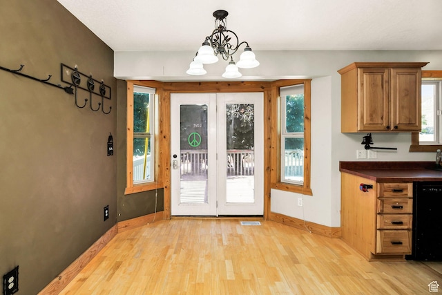 9115 W 25800 N, Portage, UT 84331 - entryway featuring light wood-type flooring and a chandelier