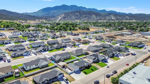 1188 N 100 E, Nephi, UT 84648 - aerial view of residential area featuring a mountain backdrop