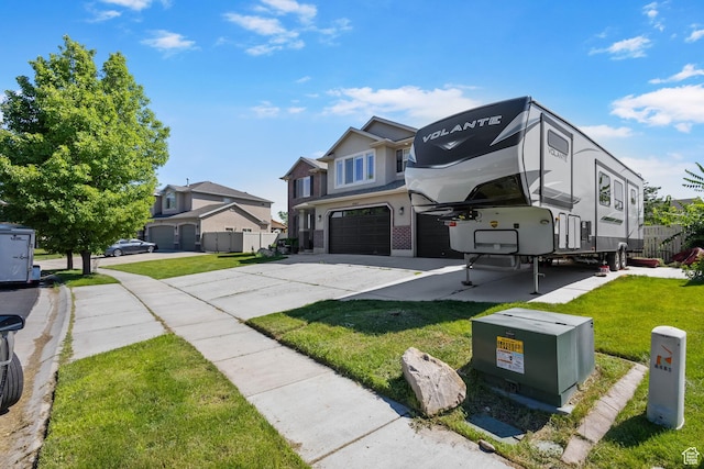 4467 W 5850 S, Hooper, UT 84315 - traditional-style home featuring a garage, a front lawn, concrete driveway, and stucco siding