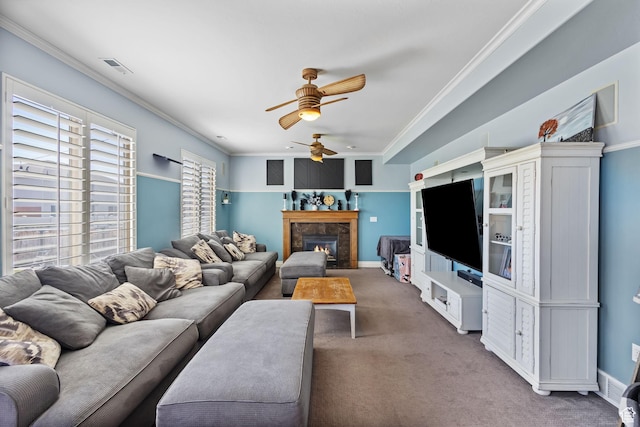 4467 W 5850 S, Hooper, UT 84315 - carpeted living area with ceiling fan, ornamental molding, and a lit fireplace