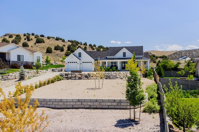 3698 E Butterfield Rd, Eagle Mountain, UT 84005 - view of front of home with driveway and an attached garage