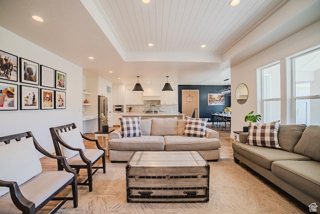 3698 E Butterfield Rd, Eagle Mountain, UT 84005 - living room featuring a raised ceiling and recessed lighting