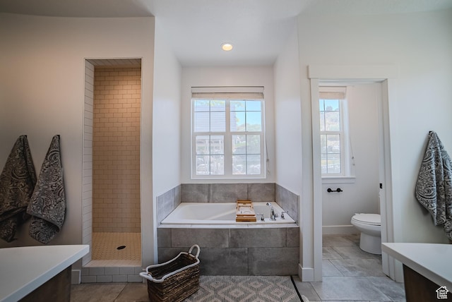 3698 E Butterfield Rd, Eagle Mountain, UT 84005 - bathroom featuring vanity, a bath, tiled shower, and tile patterned flooring