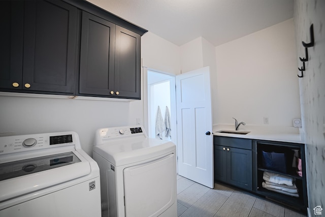 3698 E Butterfield Rd, Eagle Mountain, UT 84005 - laundry area with washer and clothes dryer and cabinet space