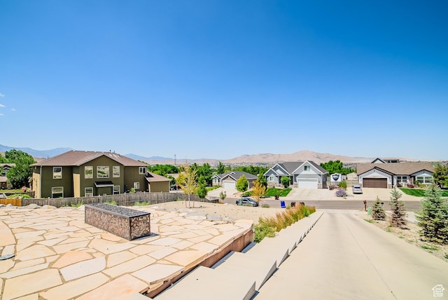 3698 E Butterfield Rd, Eagle Mountain, UT 84005 - view of patio / terrace with a mountain view and a residential view