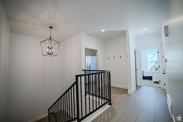 3698 E Butterfield Rd, Eagle Mountain, UT 84005 - hallway featuring an upstairs landing, a chandelier, and recessed lighting